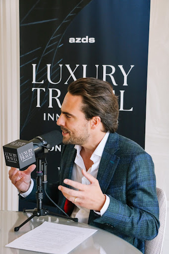 Adam Deflorian, host of the Luxury Travel Innovators podcast, during an interview for Episode 14.
