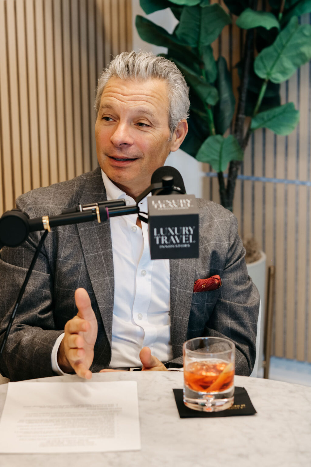 Gregory Day in the podcast studio for Episode 21 of Luxury Travel Innovators.