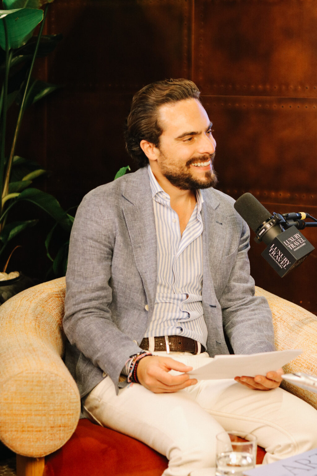 Adam Deflorian recording episode 35 of the Luxury Travel Innovators podcast.